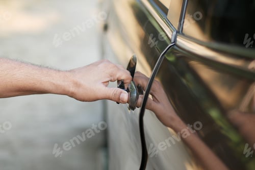 Preview: men hand open a car door