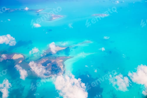 Preview: Beautiful perfect view of exotic islands and turquoise water from airplane