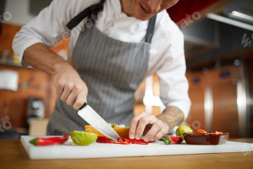 Preview: Chef Cutting Vegetables Closeup