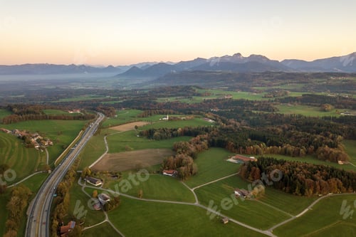 Preview: Aerial view of small scattered farm houses with red tiled roofs