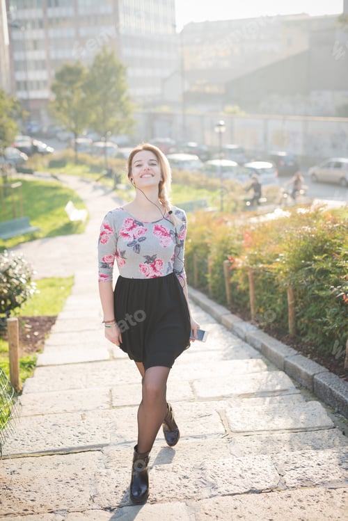 Preview: young beautiful blonde woman outdoor