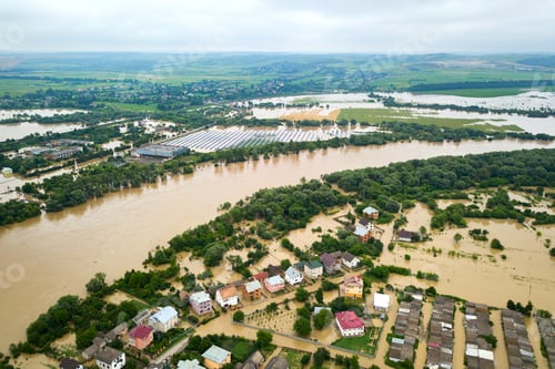 Preview: Aerial view of Dnister river with dirty water and flooded houses in Halych town, western Ukraine