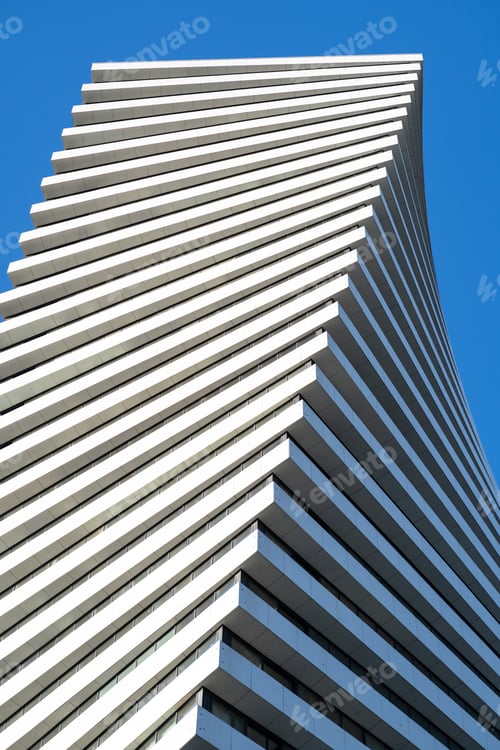 Preview: White skyscraper for company with big and spacious offices against clean blue sky in Tbilisi Georgia