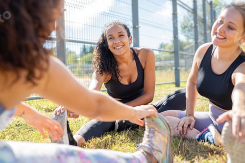 Preview: Diverse group of friends training together during sunny day.Body positive all shapes are valid.