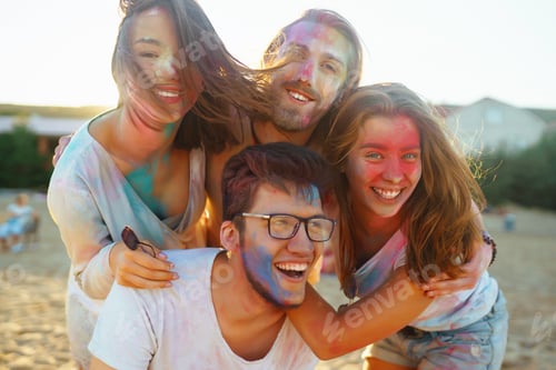 Preview: Group of friends have fun, dance at holi festival. Spring Beach Party. Friendship, Togetherness.