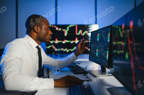 Preview: Financial Analyst Working on Computer with Multi Monitor Workstation with Real Time Stocks