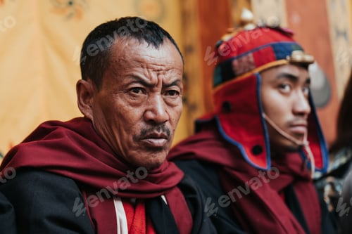 Preview: Bhutanese man worships at Tshechu festival