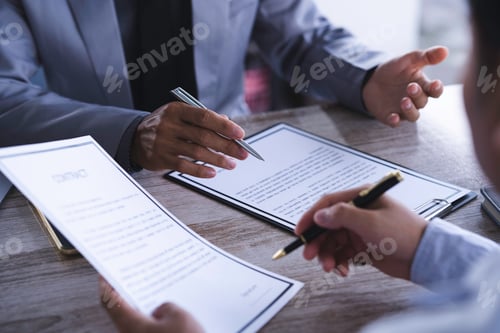 Preview: Job interview Examiner reading a resume during job interview at office, candidate at job interview i