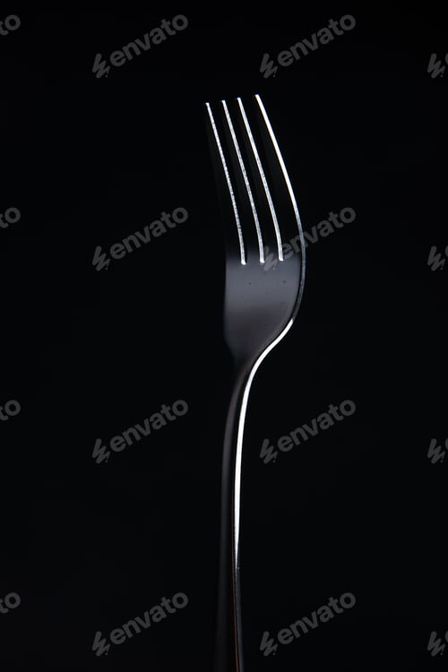 Preview: front view steel fork on black background