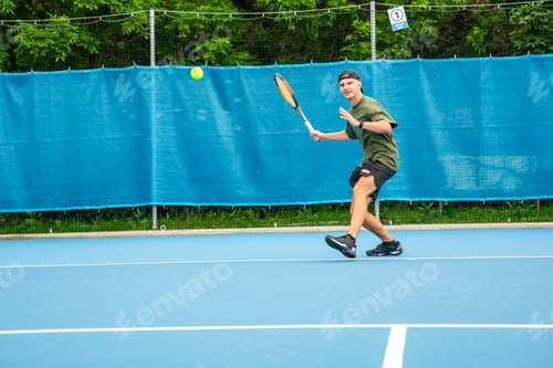 Preview: Professional male tennis player playing the tennis on outside court
