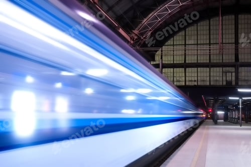 Preview: Train speeding through railway station with extended motion.