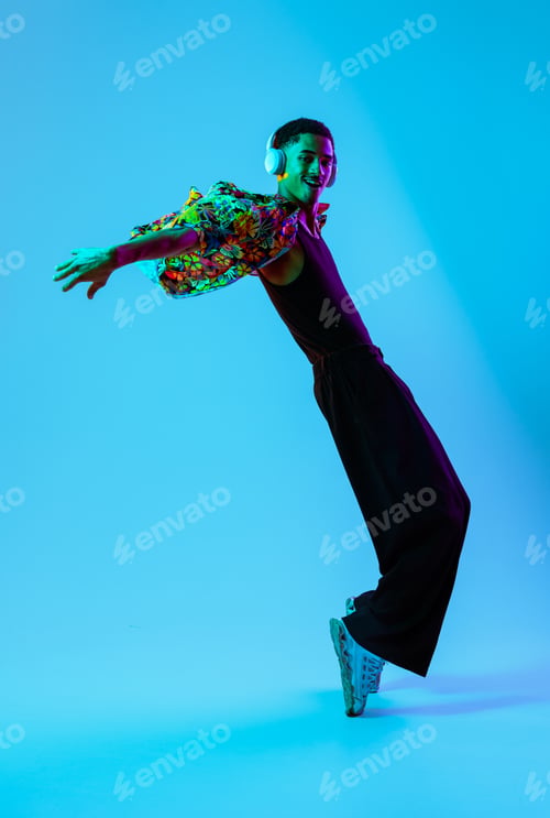Preview: African man portrait in studio on colorful background