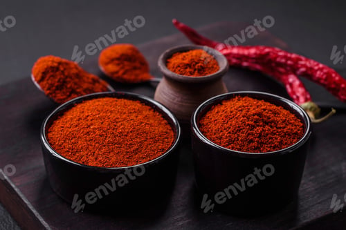 Preview: Spice smoked paprika in the form of powder in bowls and spoons