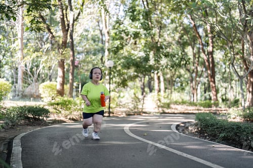 Preview: Small Body Exercising Outdoors: Stretching Muscles and Embracing Fitness in a Lush Green Park