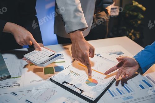 Preview: Business team analyzing financial data, working with charts and graphs