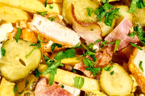 Preview: French fries with cheese sauce, chicken and bacon on a white background. Hard Light