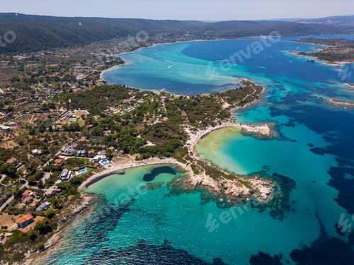 Preview: Aerial view of an island on Sithonia Peninsula, Greece, with beaches and rocks, surrounded by