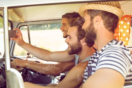 Preview: Hipster friends on road trip on a summers day
