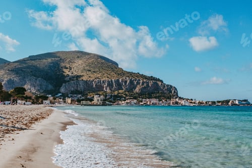 Preview: Seascape. Beautiful blu sea, sky and clouds. Sand. Mountain