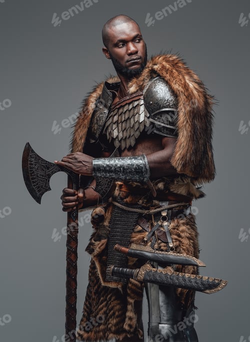 Preview: Proud warrior from the past in fur and armour holding a combat axe