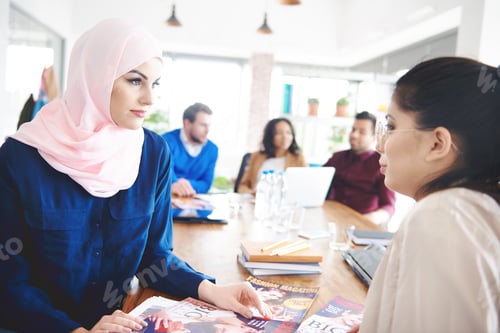 Preview: Business women doing documentary work