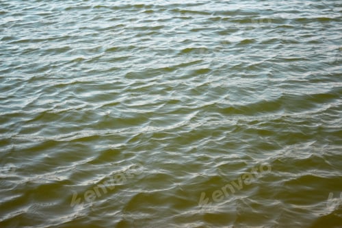 Preview: Enchanting wave water background with fluid motion and delicate light play. Kakhovka dam tragedy. Ru