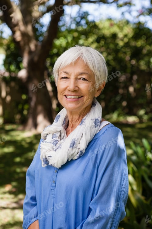 Preview: Happy Senior Woman in Garden Smiling