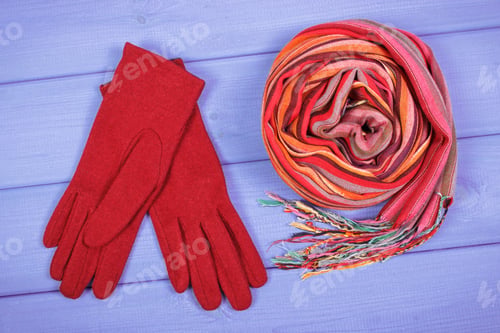 Preview: Woolen gloves and shawl for woman on boards, clothing for autumn or winter