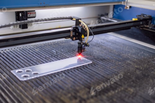 Preview: industrial CO2 laser cutting machine working with high powered red laser beam on acrylic