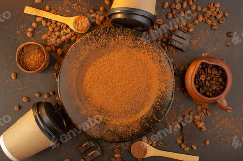 Preview: a top view brown coffee seeds with choco bars black coffee cups all over the the brown background