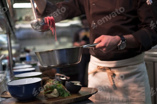 Preview: Male cook serve delicious meal in restaurant