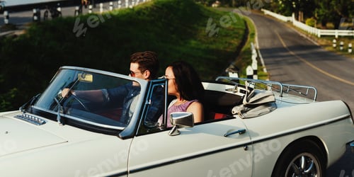 Preview: Couple Driving a Car Traveling on Road Trip Together
