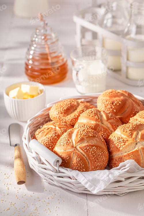 Preview: Homemade Kaiser rolls with sesame seeds for breakfast.