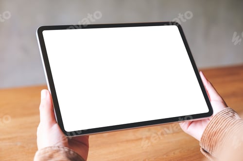 Preview: Mockup image of a woman holding digital tablet with blank white desktop screen