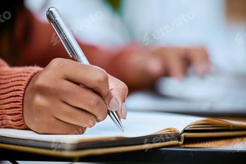 Preview: Student, writing and zoom of hand with notebook for studying, learning and notes in academic class.