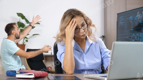 Preview: Tired woman working on the computer in the house