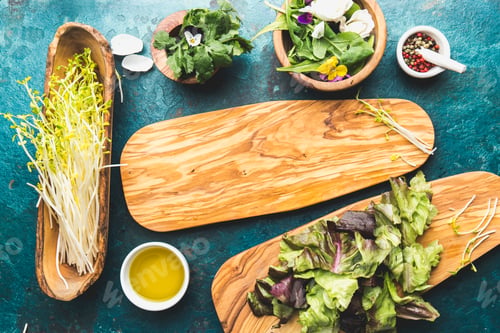 Preview: Ingredients for healthy salad - lettuce, sprouts, edibles flowers and arugula.