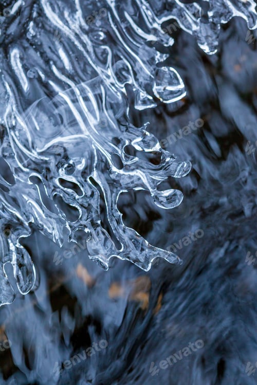 Preview: Vertical shot of vibrant ice under the natural light with a blurry background