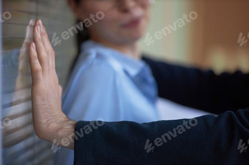 Preview: Man pushing woman against wall in office, workplace harassment scene