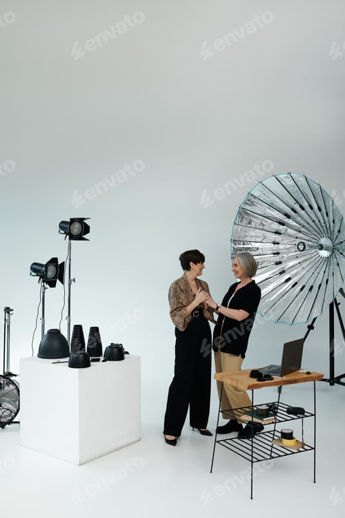 Preview: Capturing love: middle aged lesbian couple in photo studio