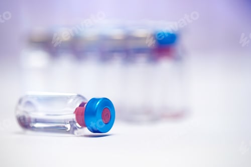 Preview: Close up on vaccine and medical syringe