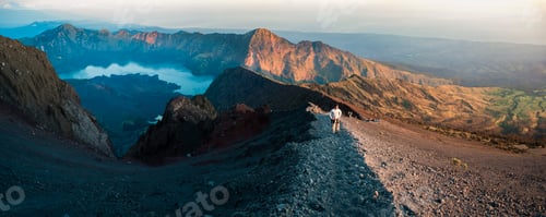 Preview: Panoramic Photo of a Tourist on the Final Push to the 3726m Summit of Mount Rinjani at Sunrise, Indo