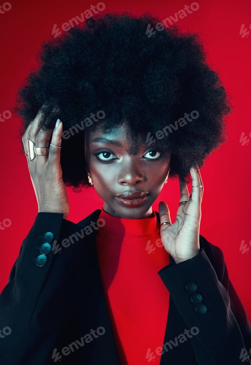 Preview: Black woman, makeup and afro, hair and beauty in portrait with shine isolated on red background. Ha