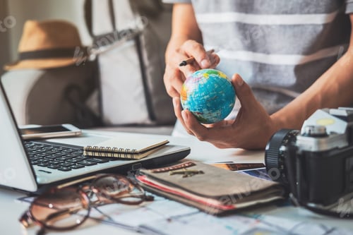 Preview: Young traveler planning vacation trip and searching information
