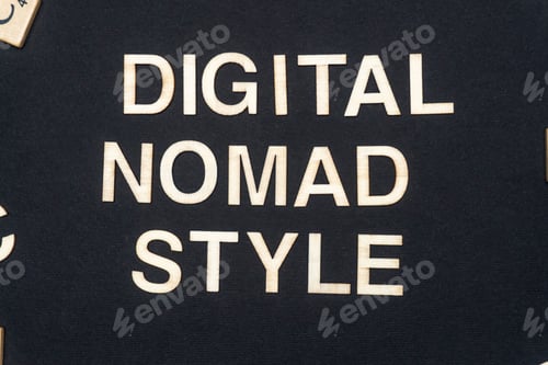 Preview: DIGITAL NOMAD STYLE word written on dark paper background. DIGITAL NOMAD STYLE text for your concept