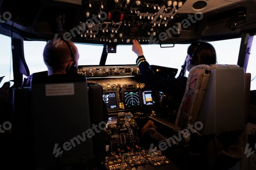 Preview: Woman copilot assisting captain to takeoff and fly airplane