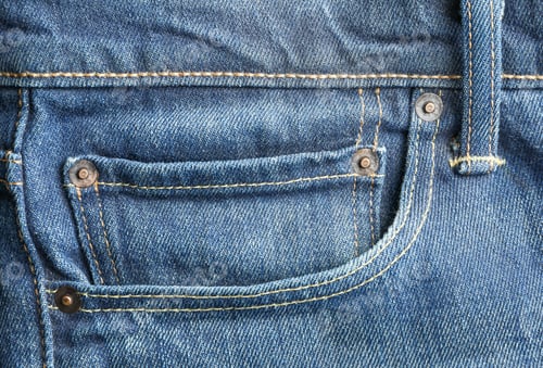 Preview: Closeup view of jeans pocket as background, space for text