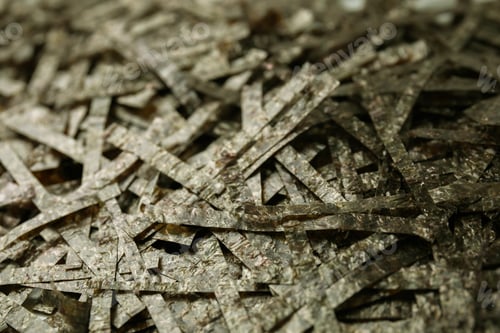 Preview: Chopped crispy nori sheets as background, closeup