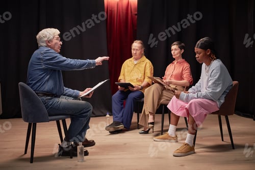 Preview: Senior Caucasian Man Performing to Diverse Adults during Talent Competition