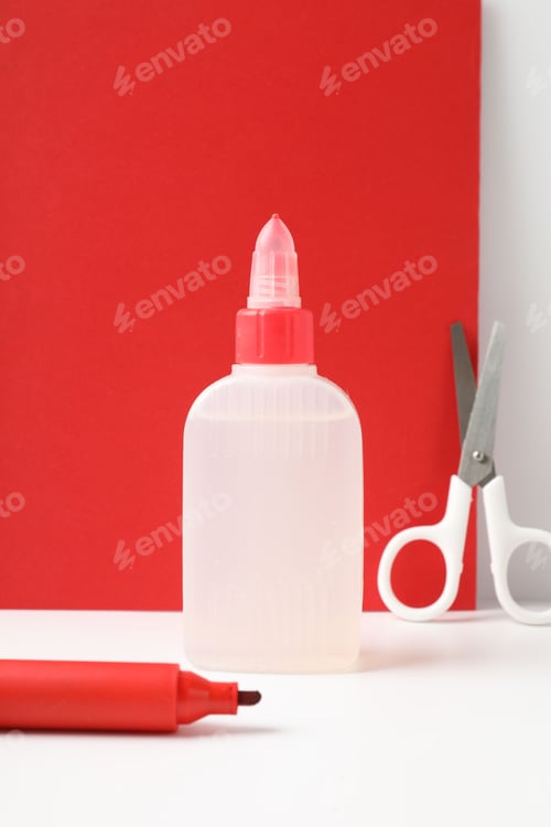 Preview: School Supplies Still Life on Red and White